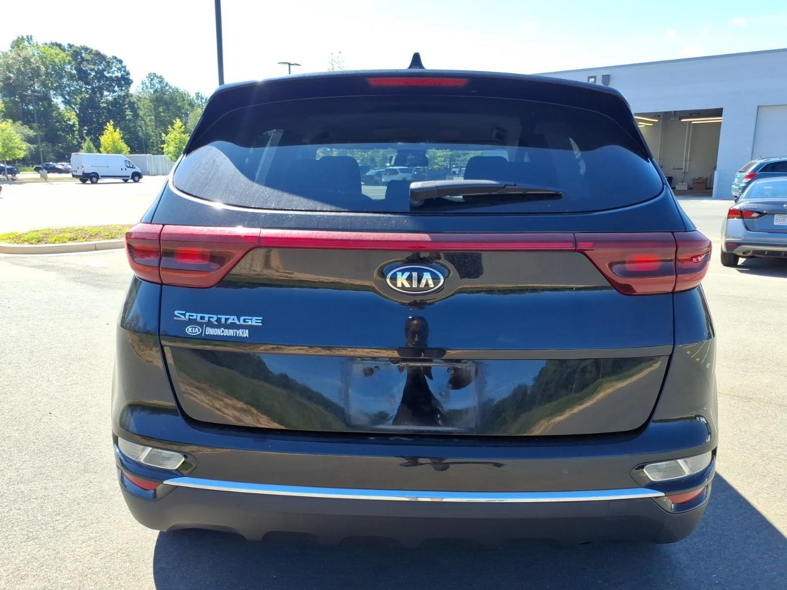 Used 2022 Black Cherry Kia LX image 16