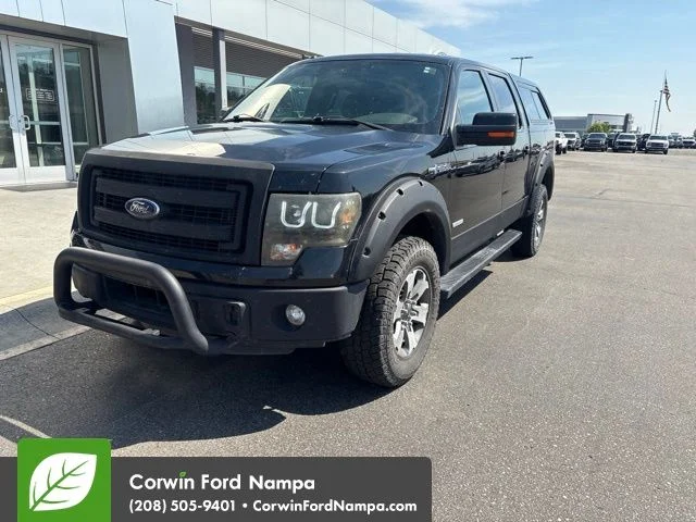 Used 2014 Black Ford FX4 image 1
