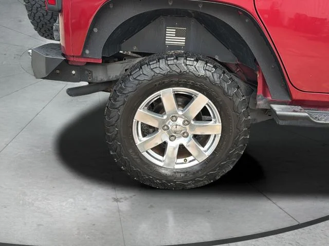 Used 2013 Red Jeep Unlimited Sahara image 32