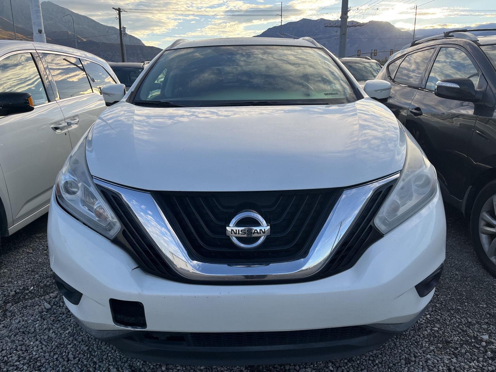 Used 2015 Pearl White Nissan Platinum image 2