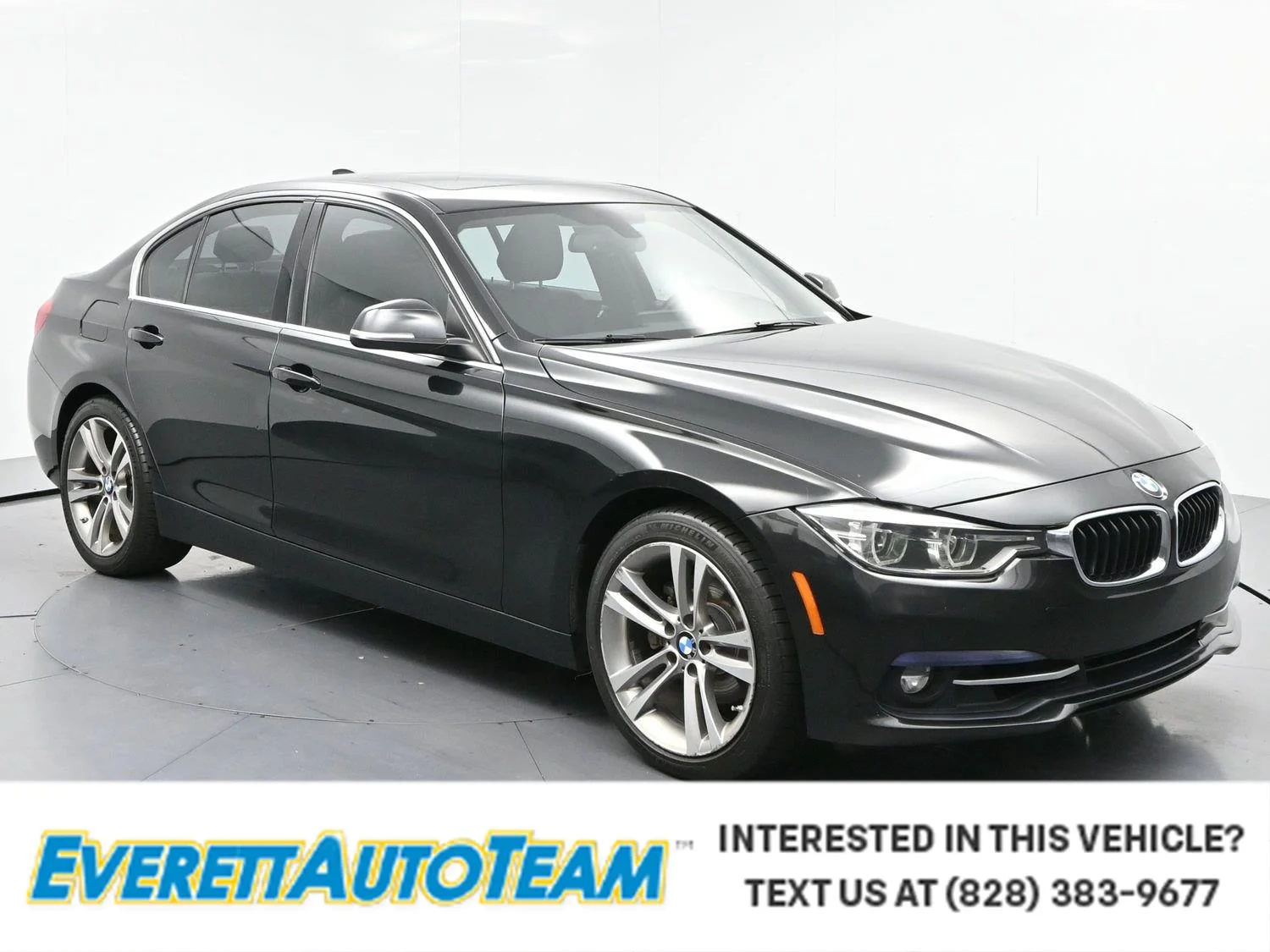 Used 2018 Black Sapphire Metallic BMW 330i image 1
