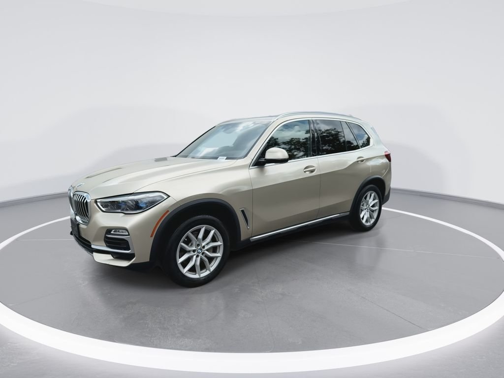 Used 2019 Sunstone Metallic BMW xDrive40i image 4