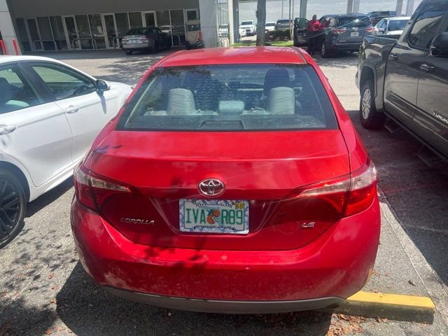 Used 2018 Barcelona Red Metallic Toyota LE image 11