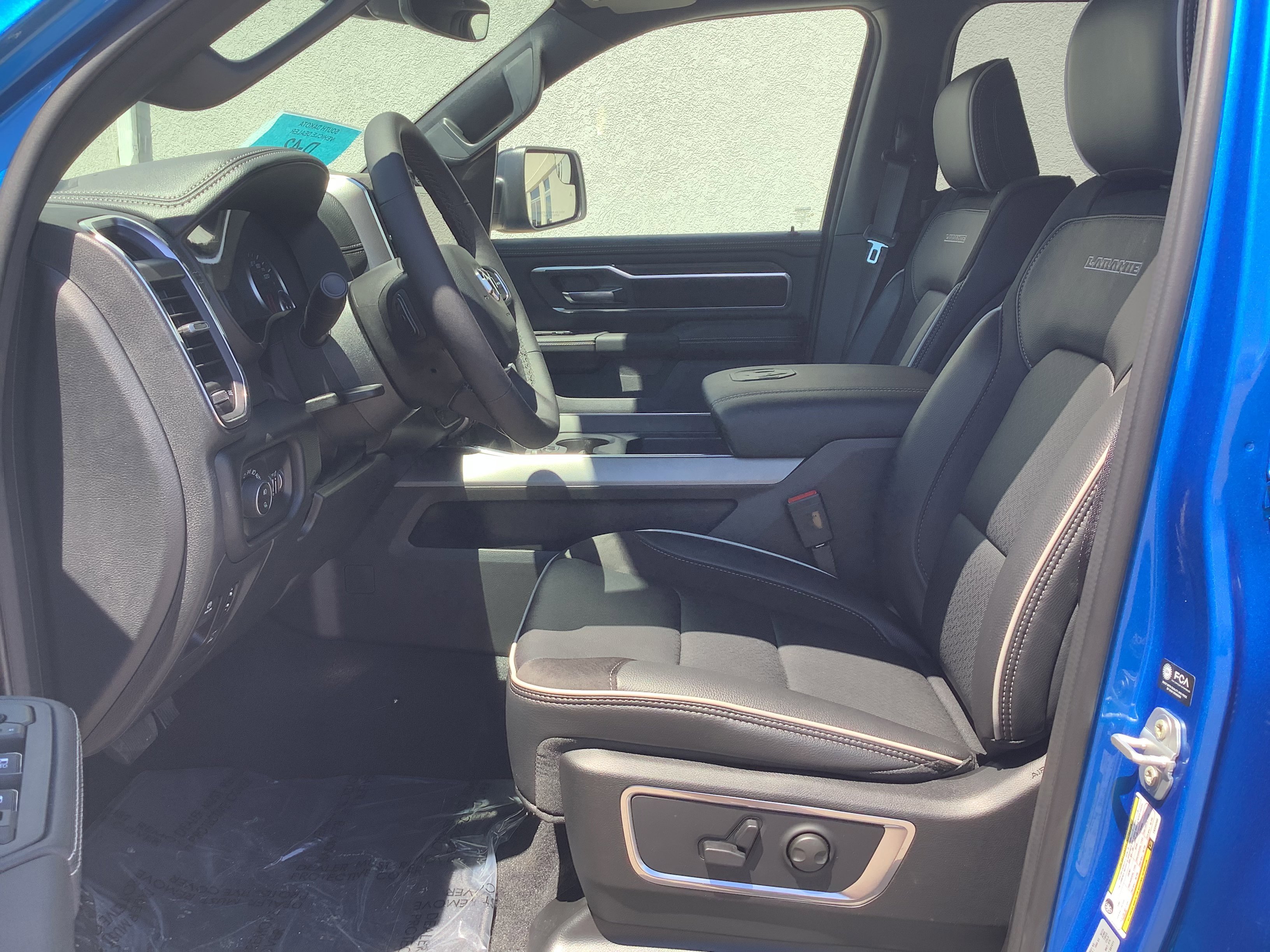 New 2026 Hydro Blue Pearl-Coat Exterior Paint RAM Laramie image 9