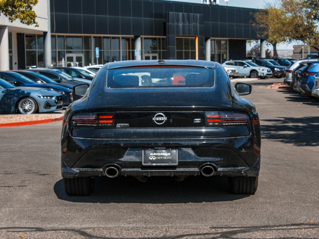 Used 2024 Black Diamond Pearl Nissan Sport image 6