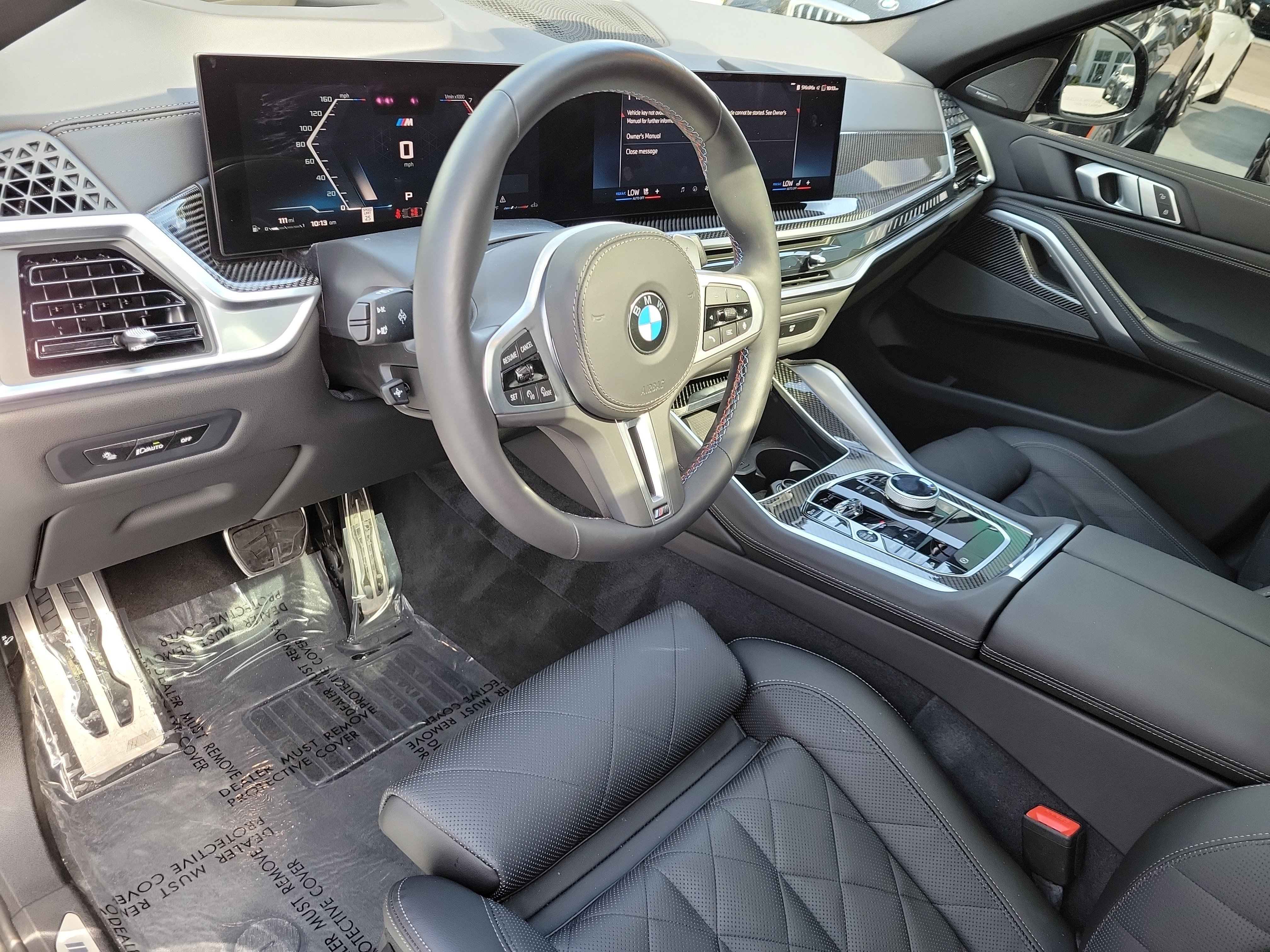 Certified Used 2025 Carbon Black Metallic BMW M60i image 19