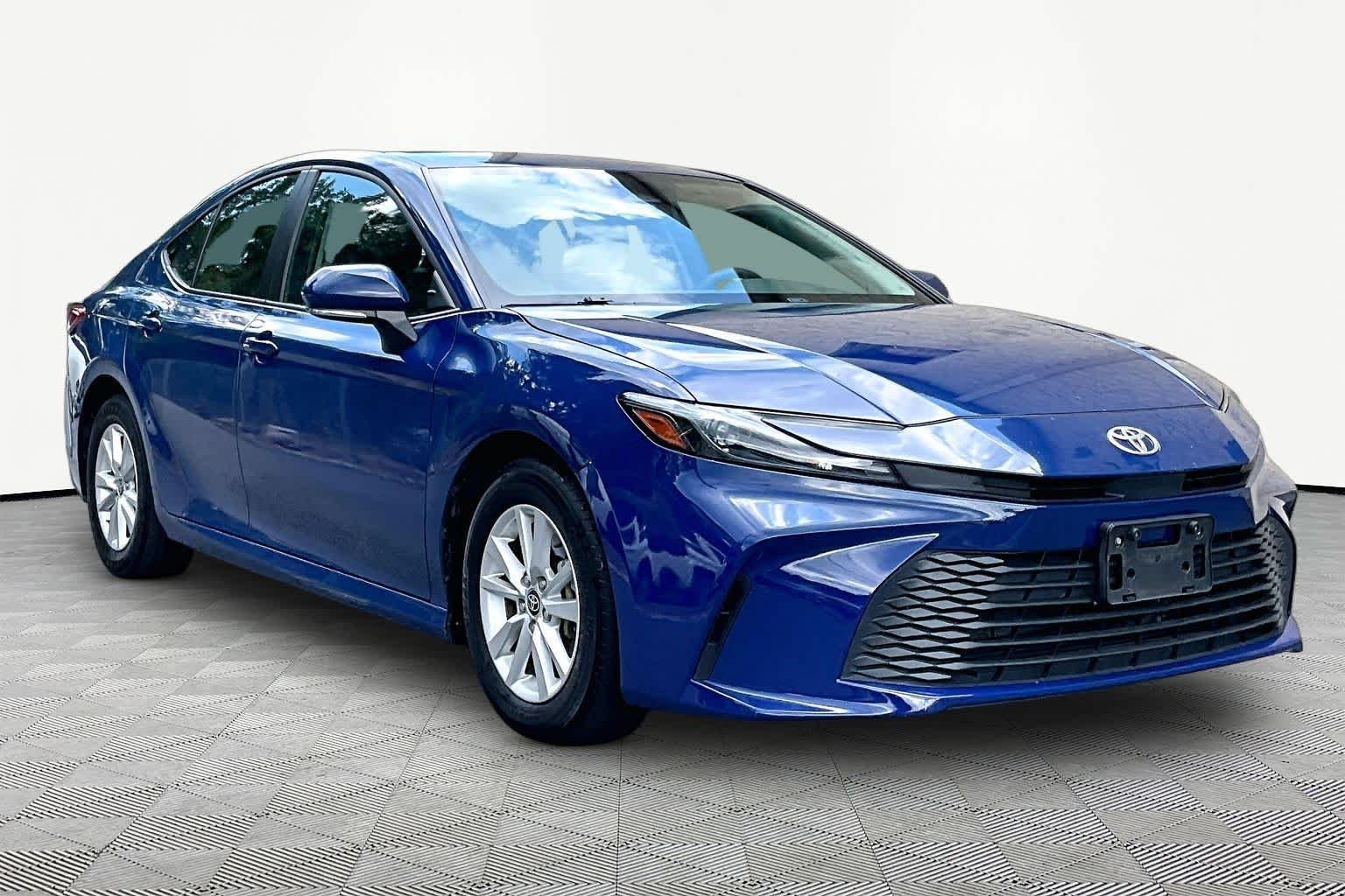 Used 2025 Reservoir Blue Toyota LE image 3
