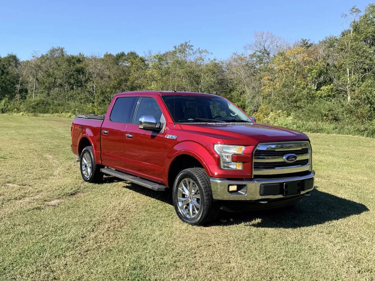 Used 2016 Red Ford Lariat 4x4 4dr SuperCrew 5.5 ft. SB image 7