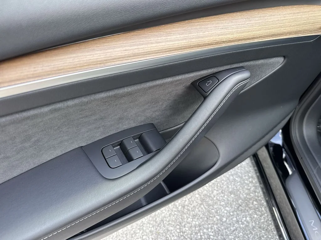 Used 2023 Solid Black Tesla  image 40