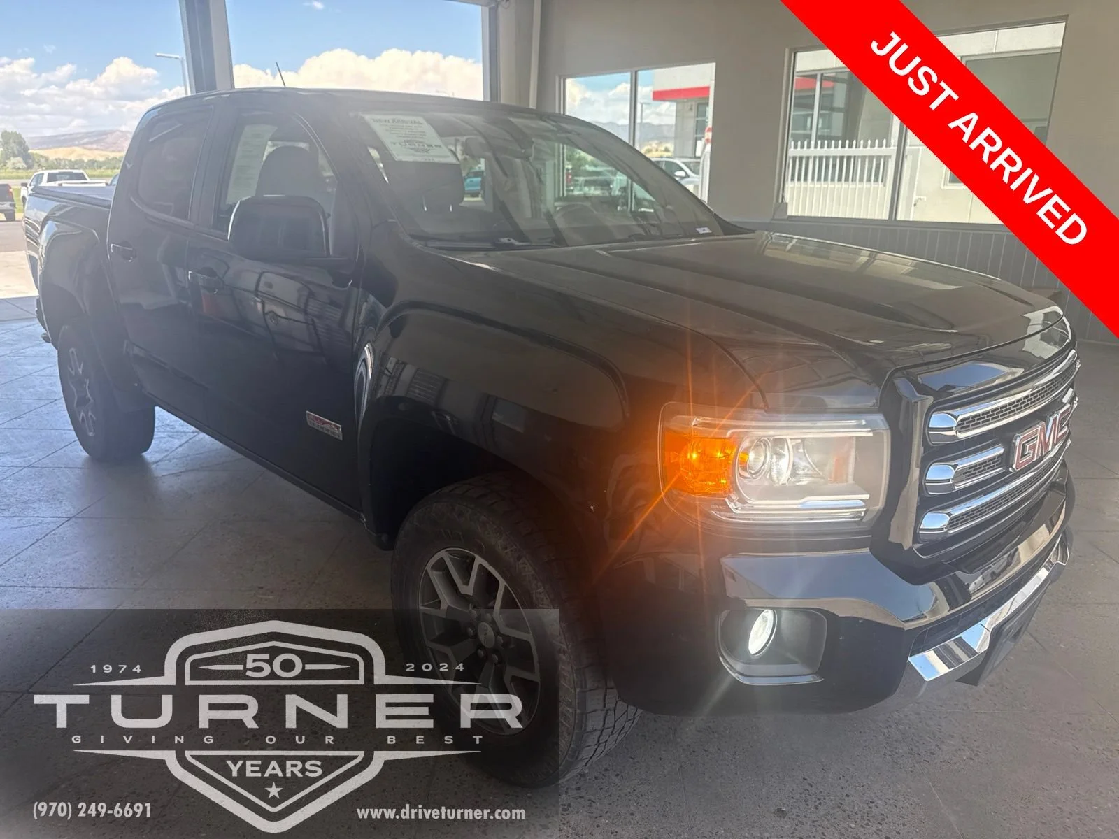 Used 2015 ONYX BLACK GMC 4WD SLE image 1