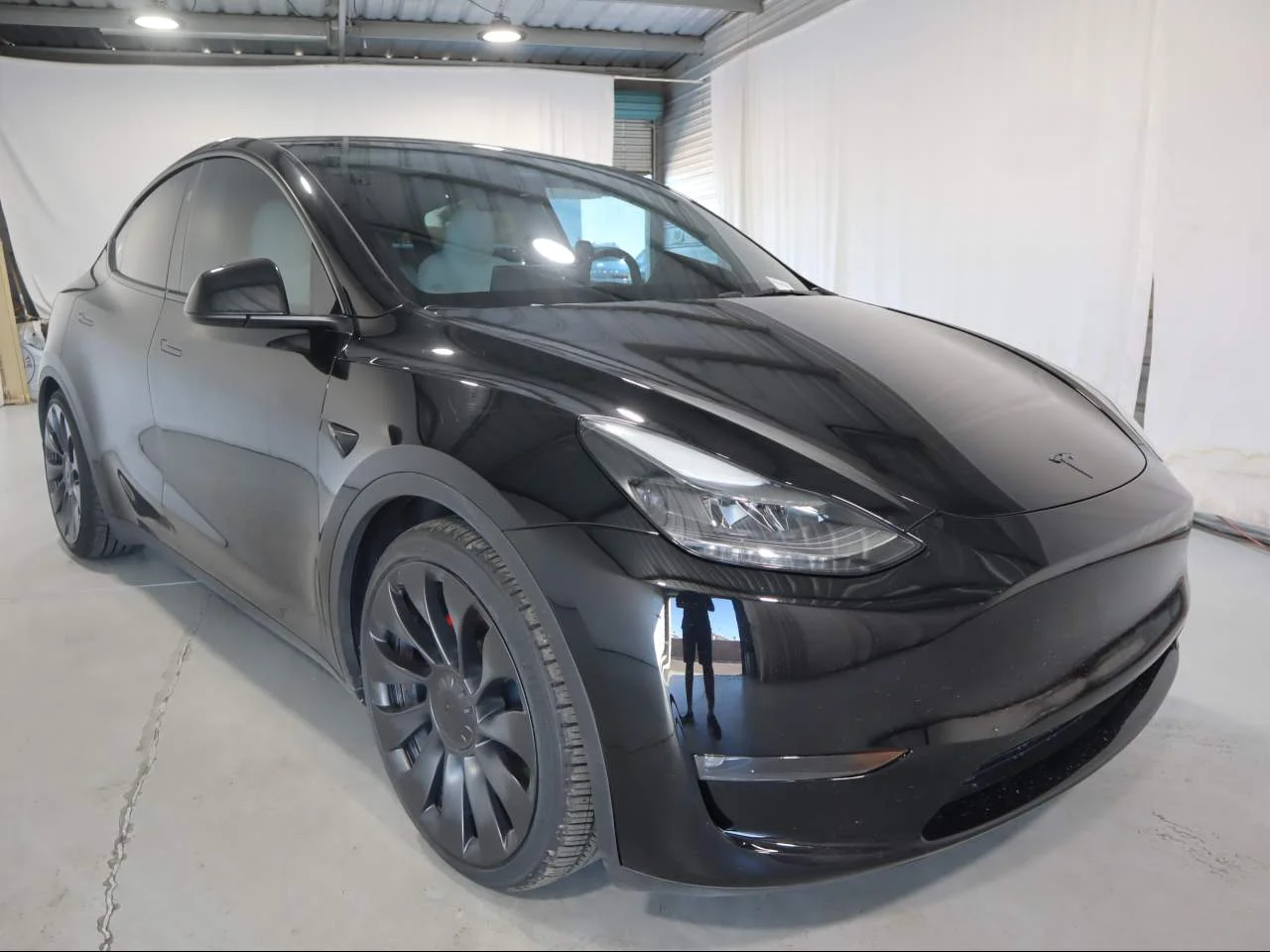 Used 2024 Solid Black Tesla Performance image 3