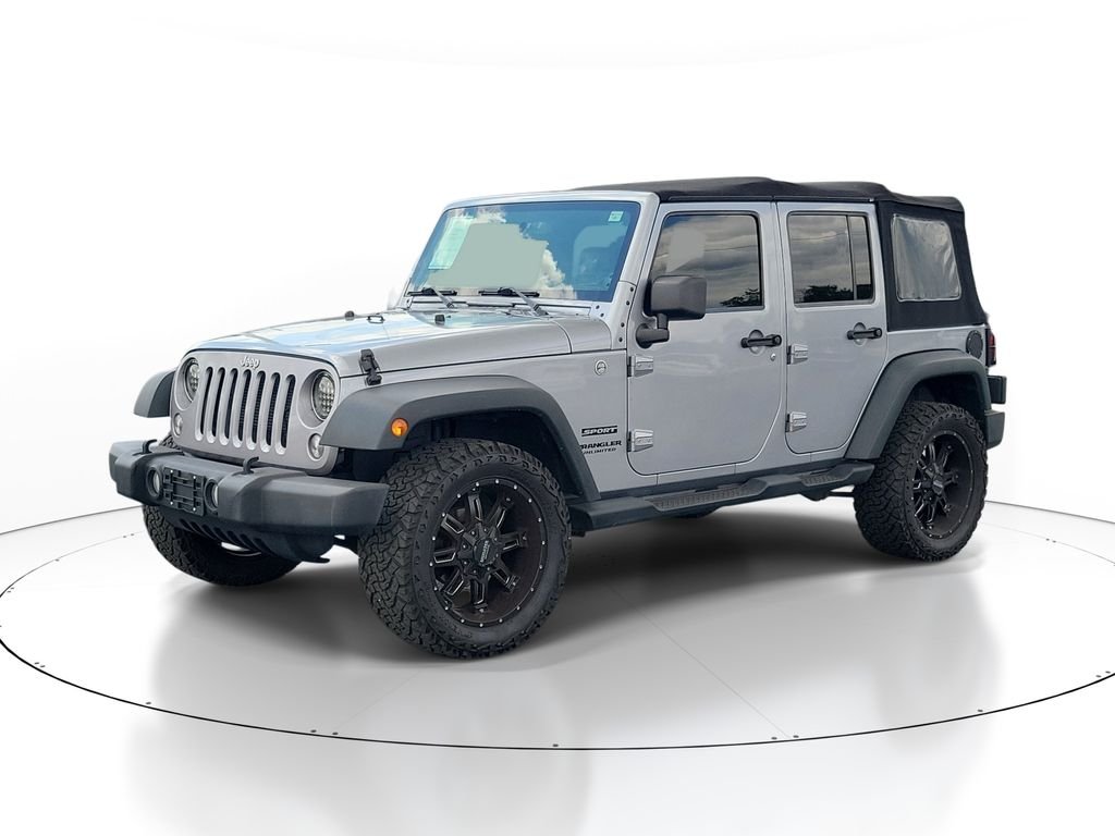 Used 2014 Jeep Wrangler Unlimited Sport with VIN 1C4BJWDG3EL105184 for sale in Shorewood, IL
