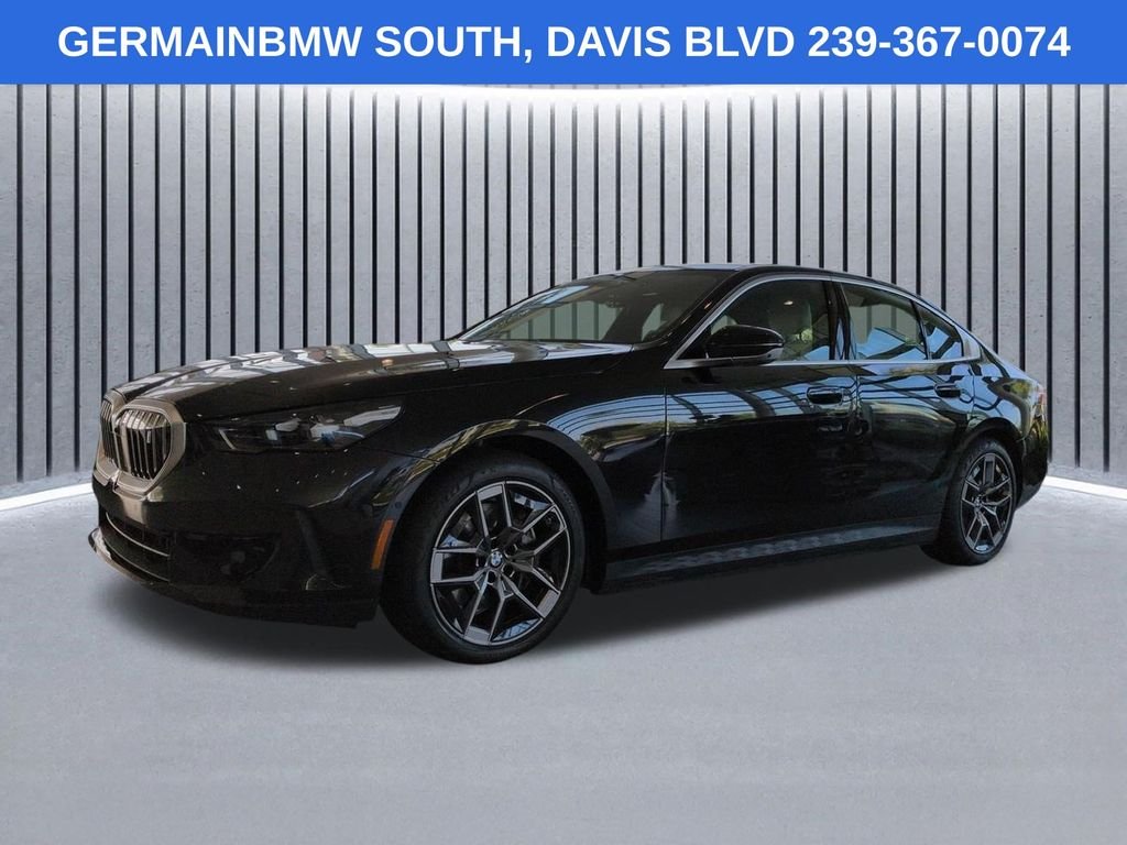 Used 2026 Black Sapphire Metallic BMW eDrive40 image 1