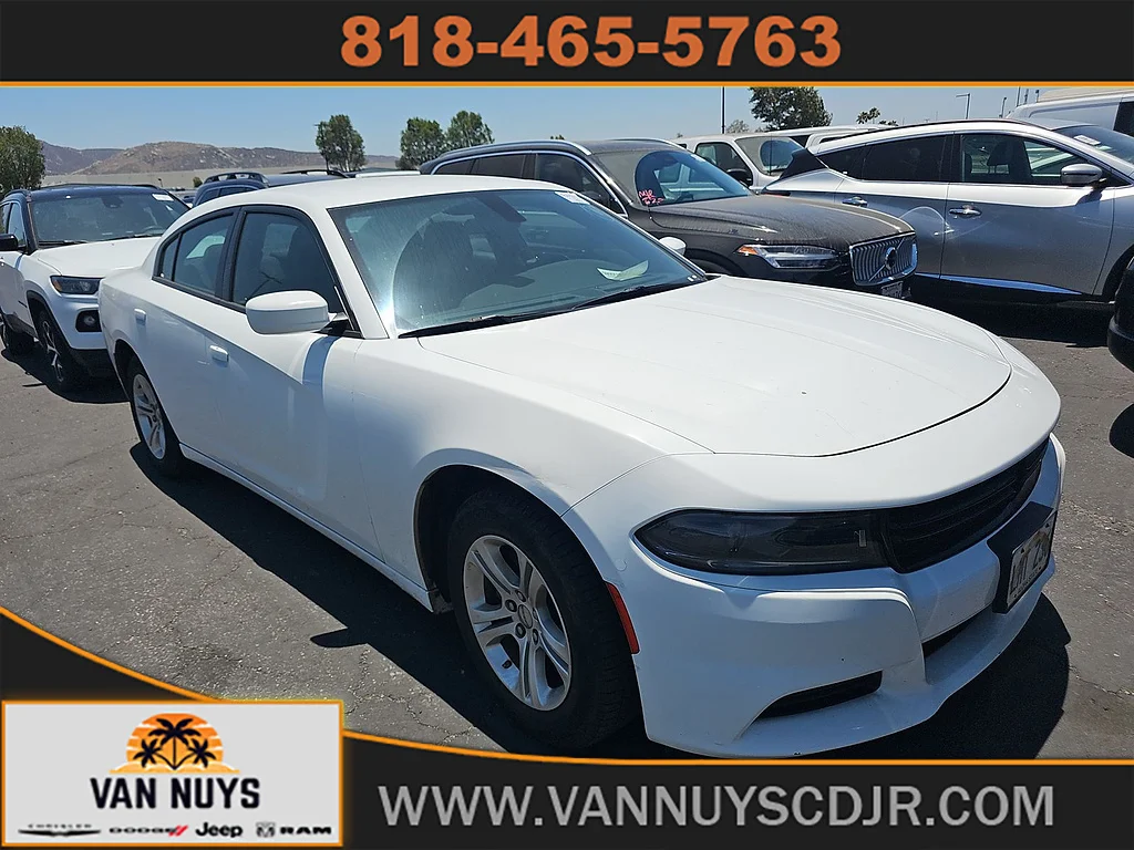 Used 2022 White Knuckle Clear Coat Dodge SXT image 1
