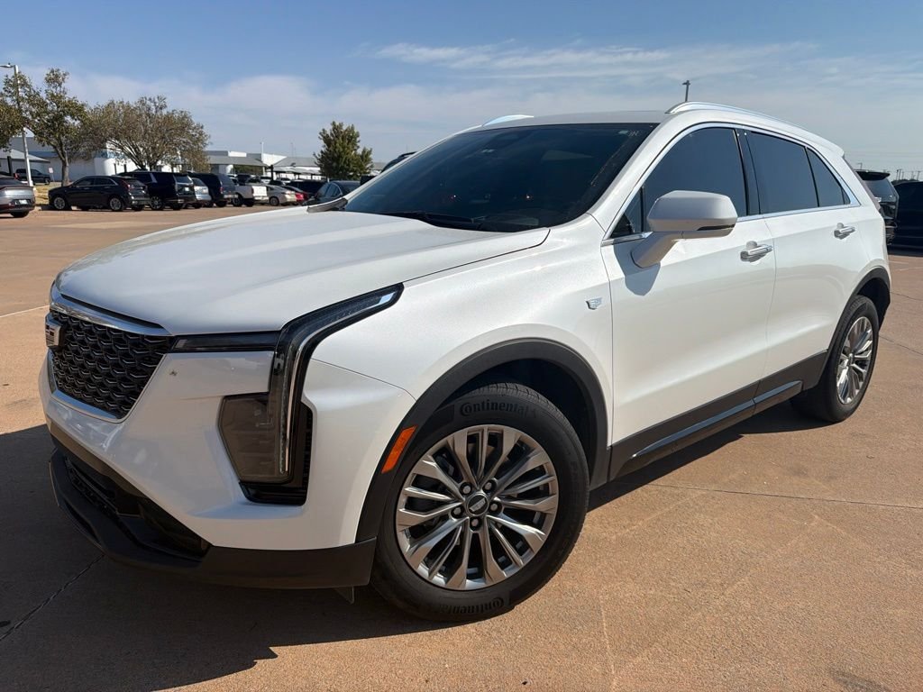 Used 2024 White Cadillac Premium Luxury image 1