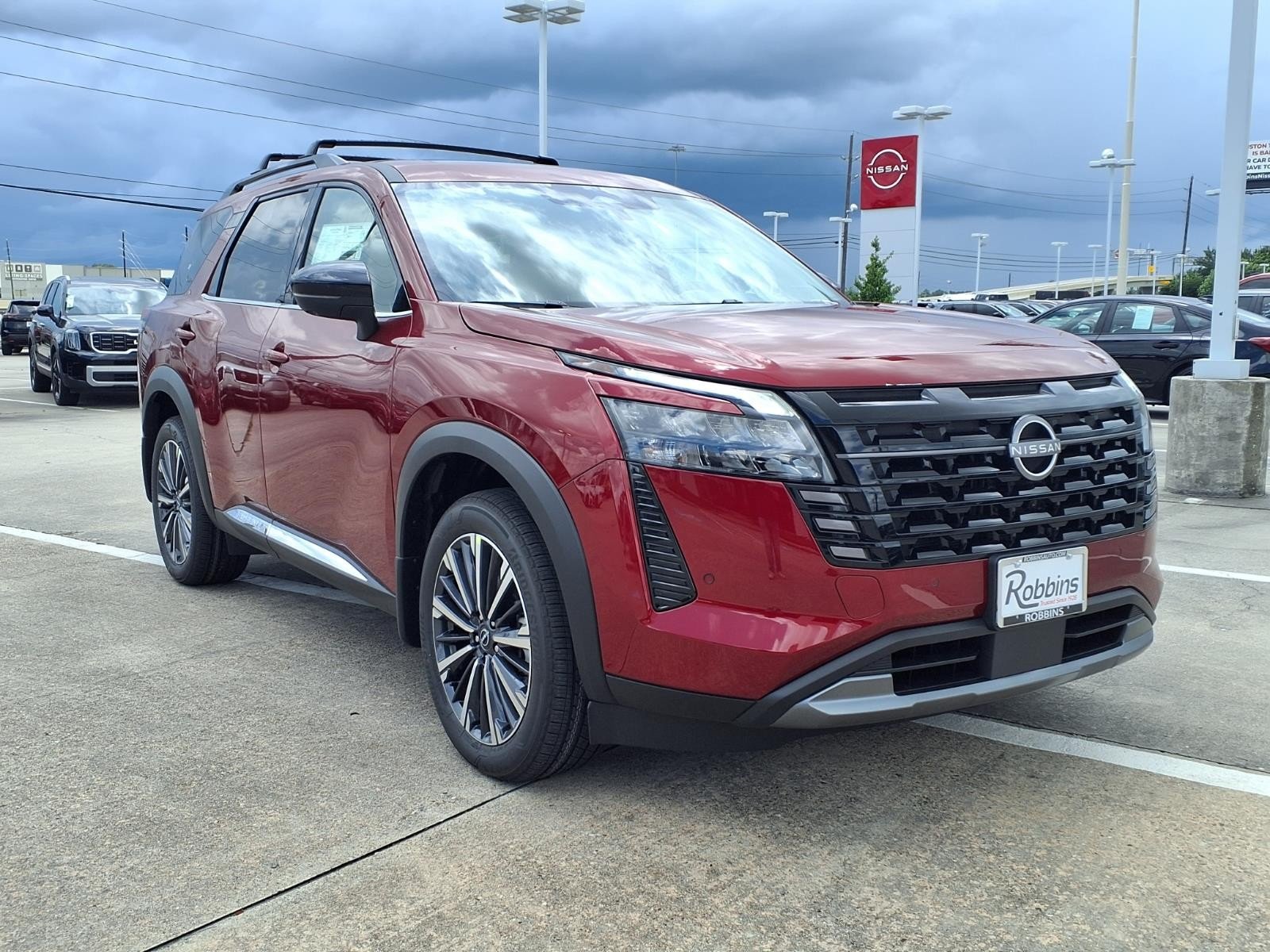 2026 Nissan Pathfinder Platinum Red at Robbins Nissan