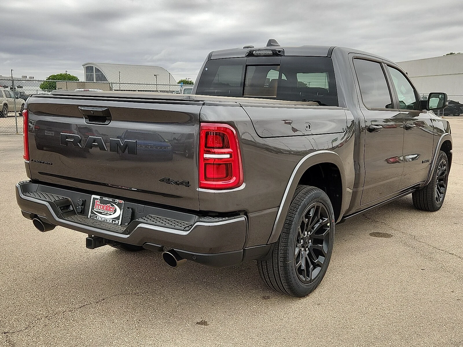 New 2026 Granite Crystal Metallic Clearcoat Ram LIMITED CREW CAB 4X4 5