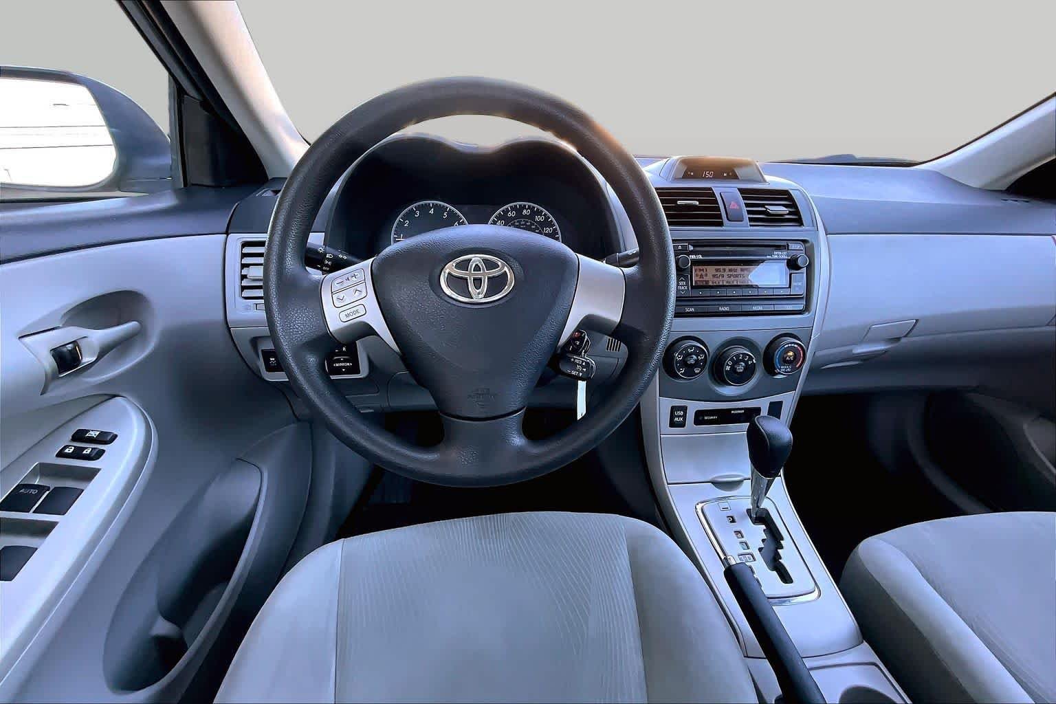 Used 2012 Classic Silver Metallic Toyota LE image 6
