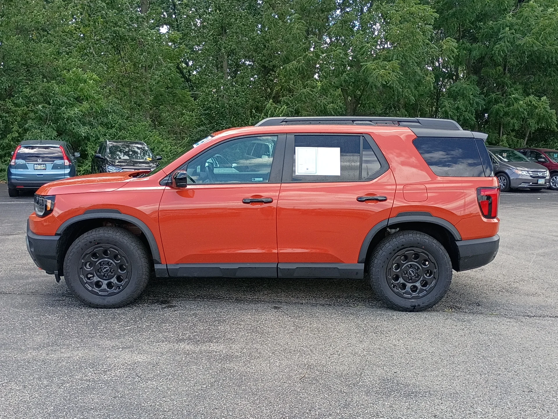 Certified Used 2026 Sunset Orange II Honda TrailSport Blackout image 6