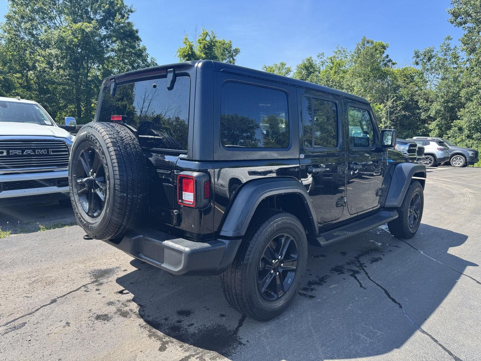 Used 2023 Black Clearcoat Jeep Sport Altitude image 3