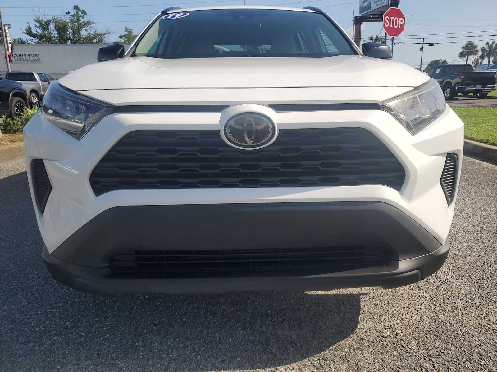 Used 2019 Super White White Toyota LE image 12