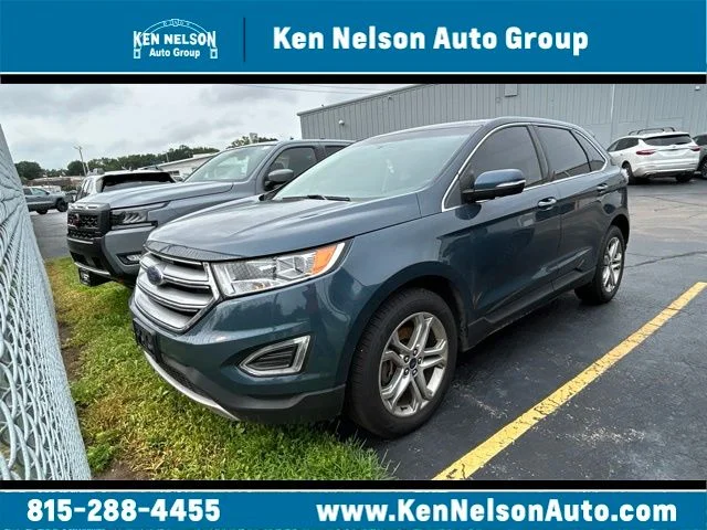 Used 2016 Blue Metallic Ford Titanium image 1