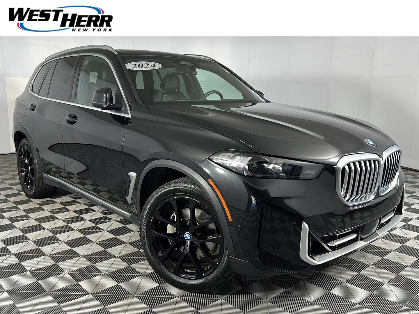 Used 2024 Black Sapphire Metallic BMW xDrive40i image 1