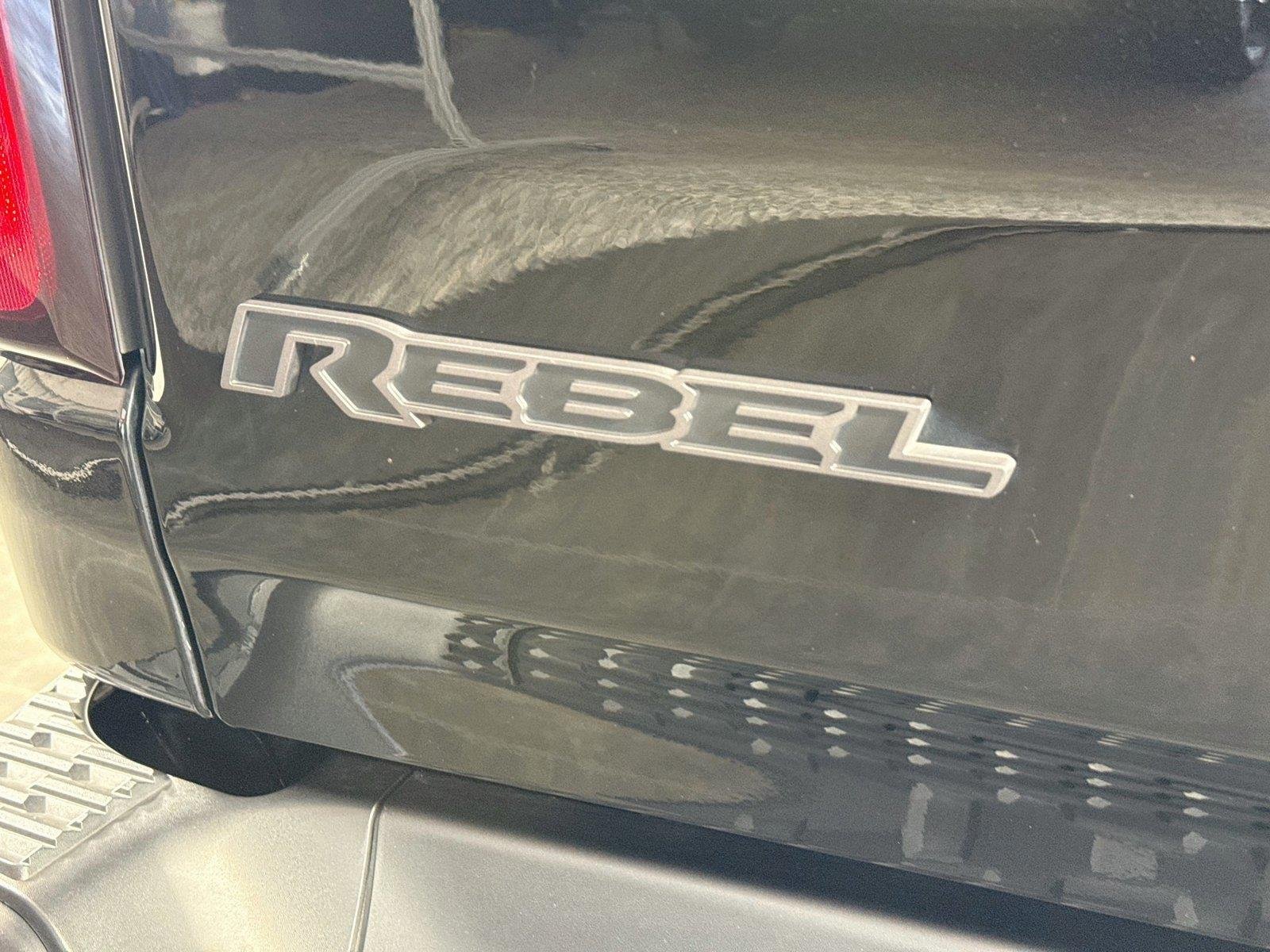 Used 2025 Diamond Black Crystal Pearlcoat Ram Rebel image 15