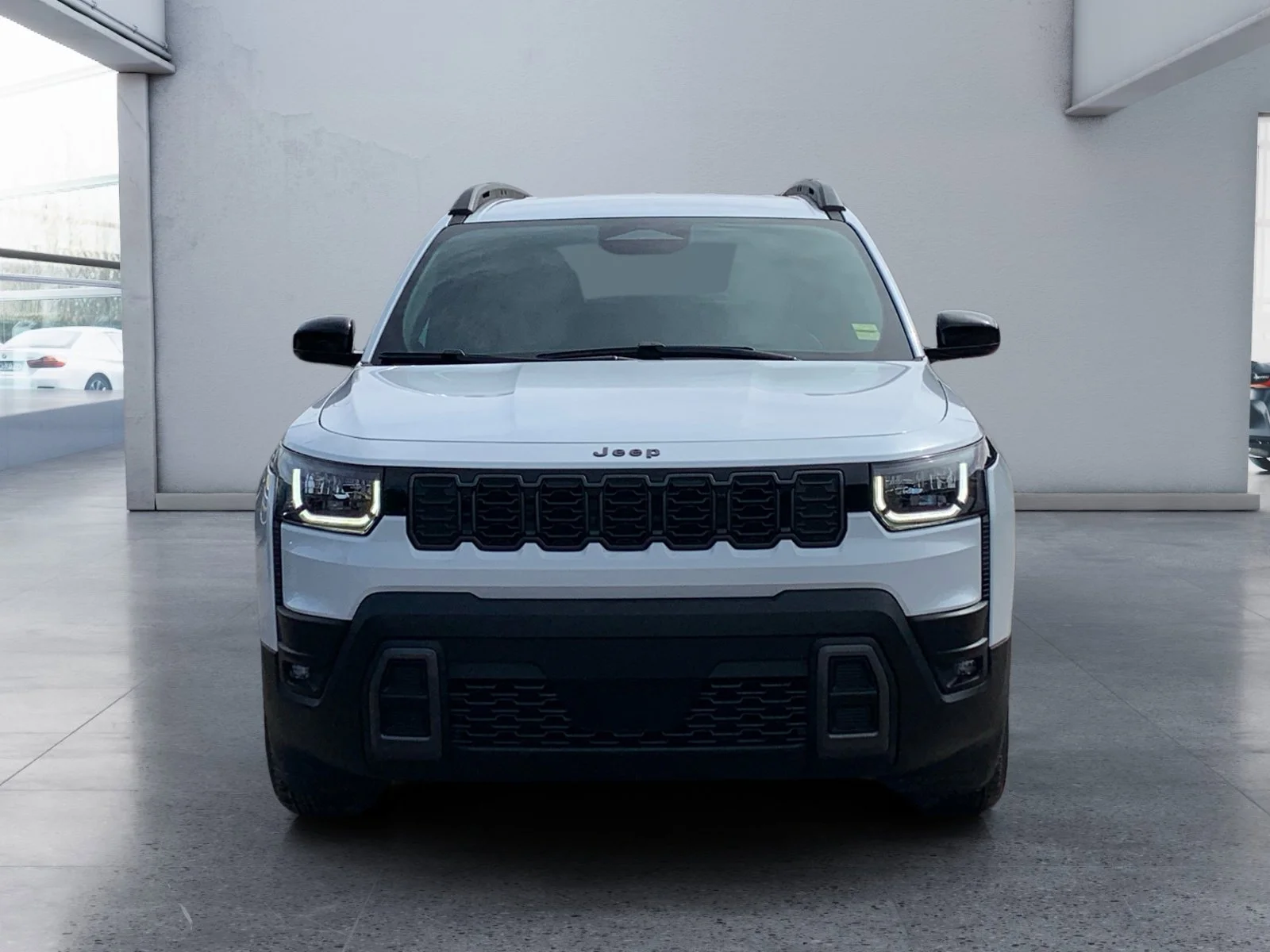 New 2026 Bright White Jeep Laredo image 8