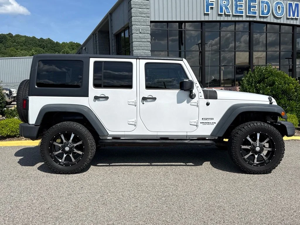 Used 2013 Bright White Jeep Unlimited Sport image 7