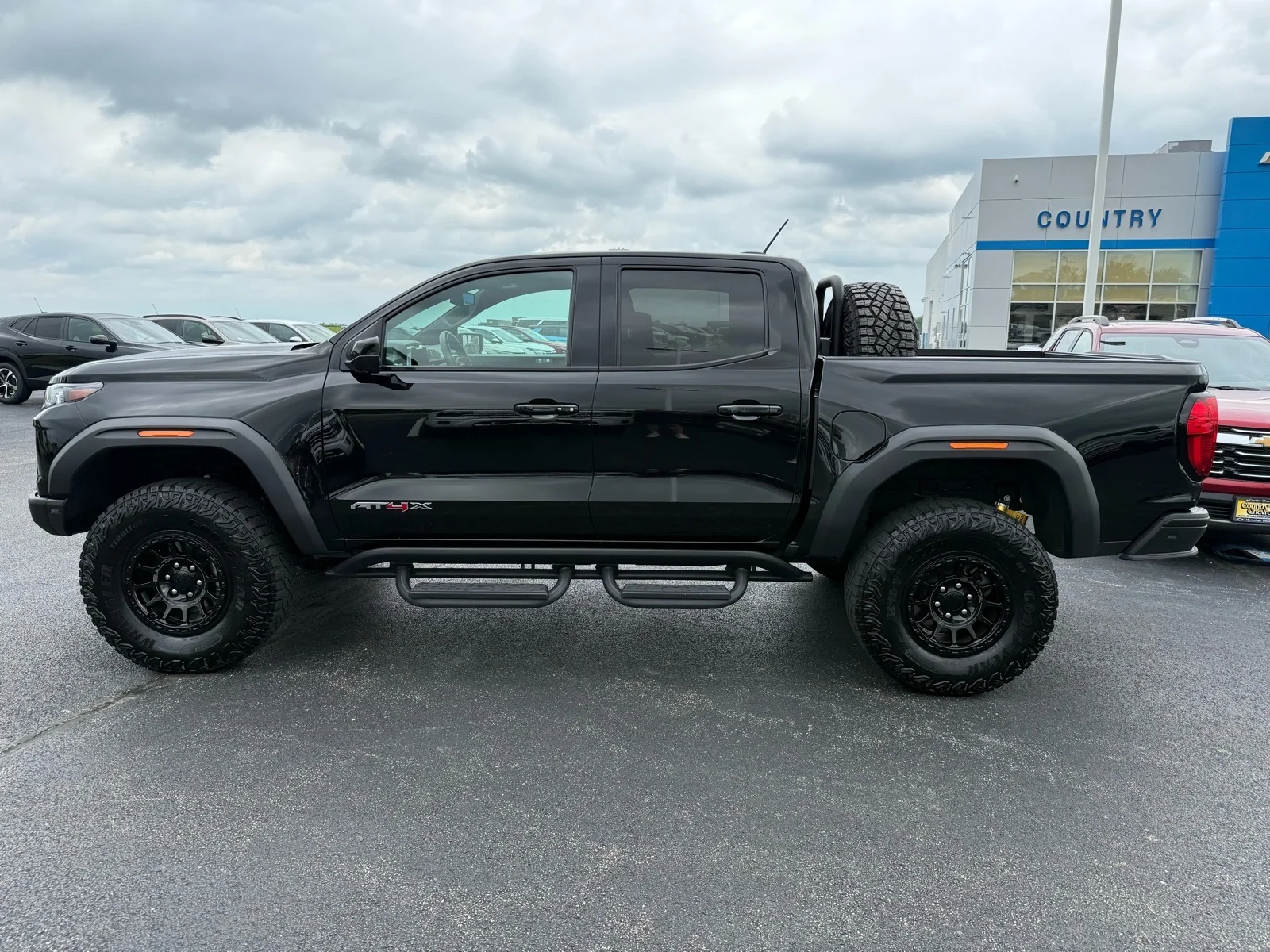 Used 2024 Onyx Black GMC AT4X image 4
