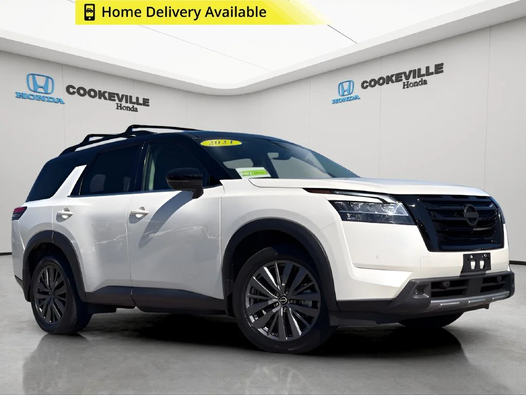 Used 2024 Pearl White Tricoat/Super Black Nissan SL image 1