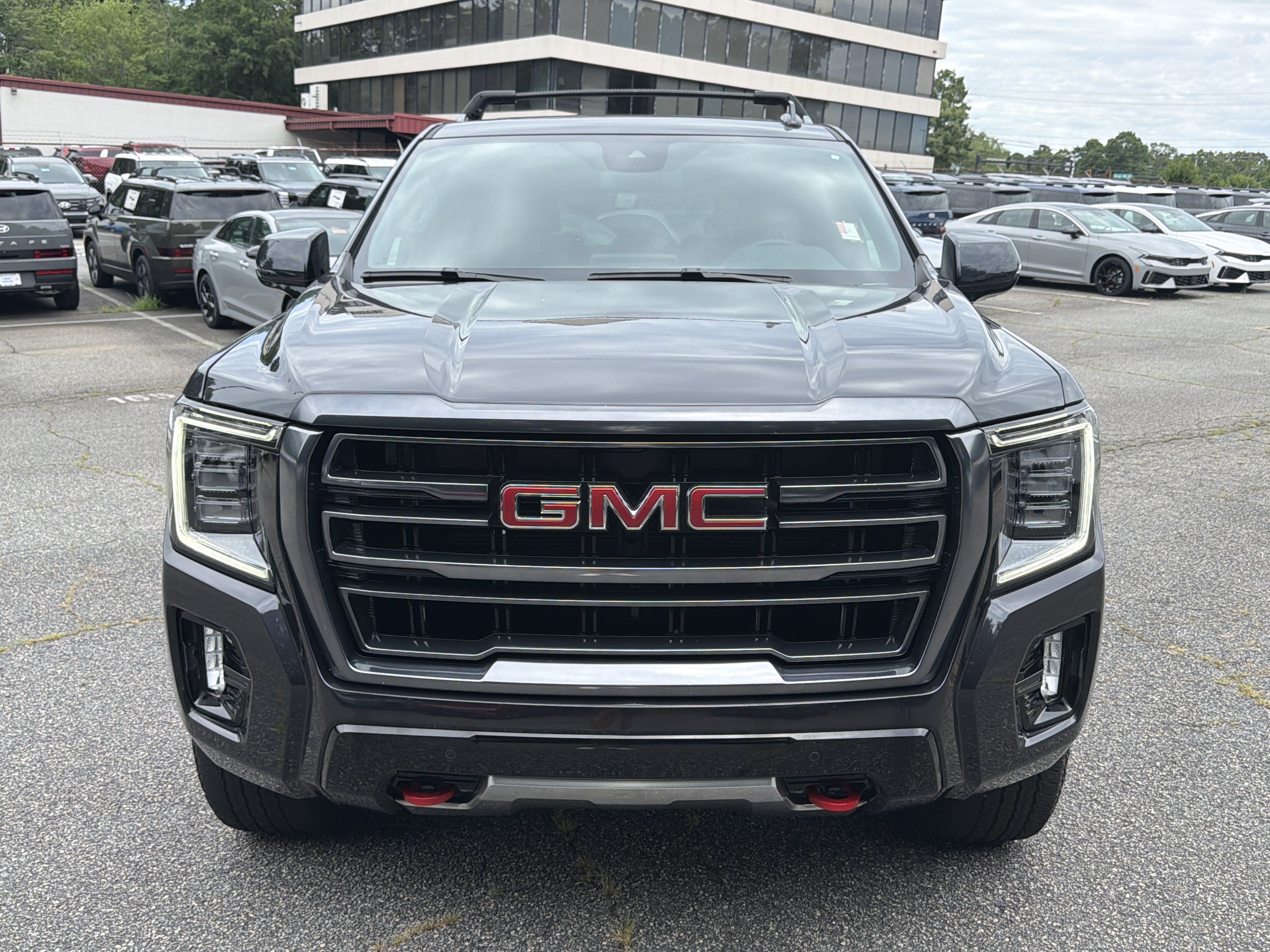 Used 2024 Titanium Rush Metallic GMC AT4 image 2