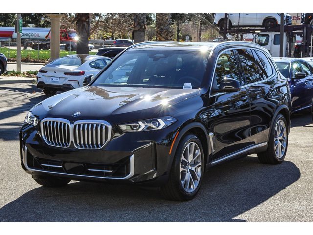 New 2026 Black Sapphire Metallic BMW xDrive50e image 3