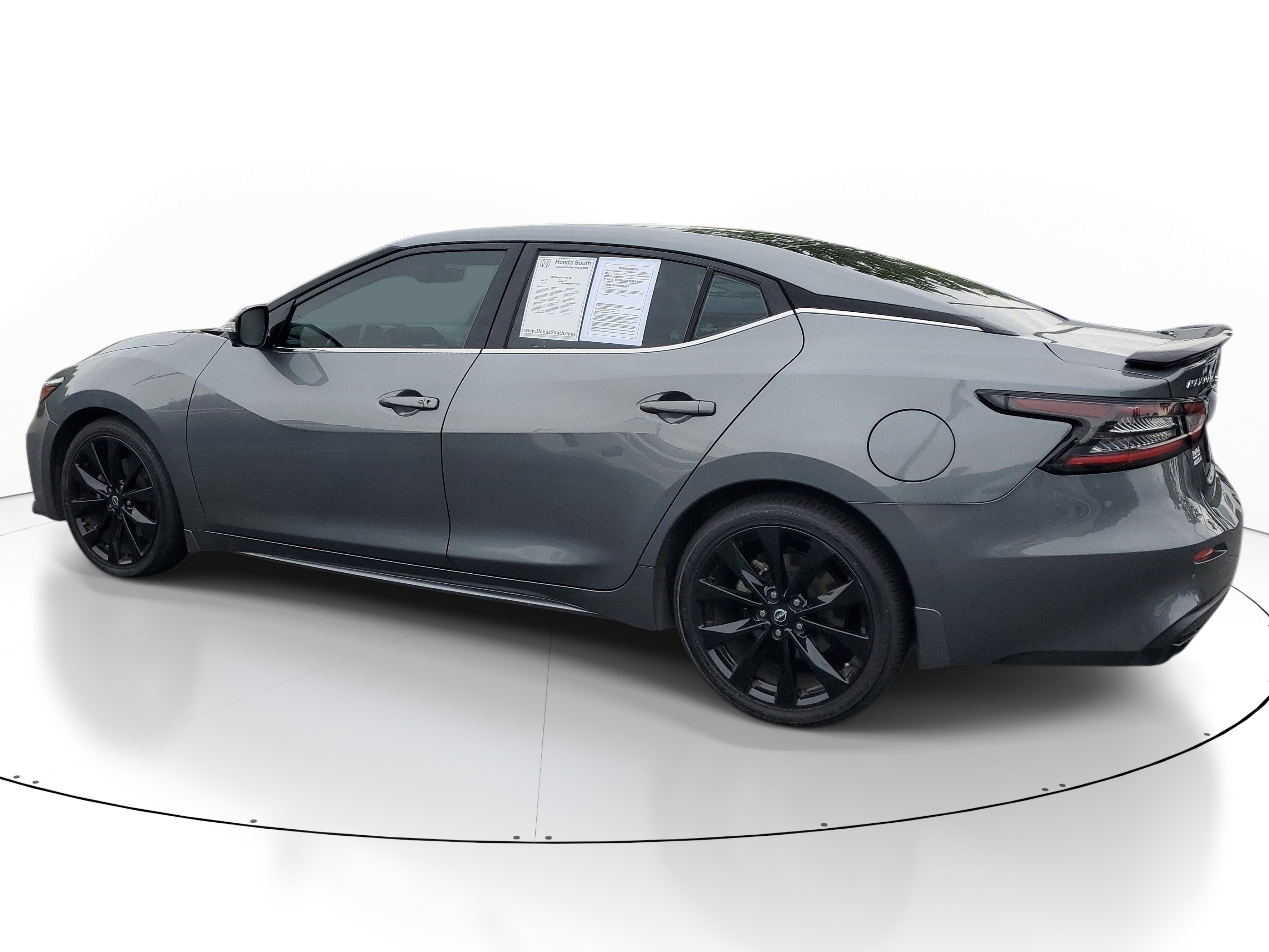 Used 2023 Gun Metallic Nissan SR image 3