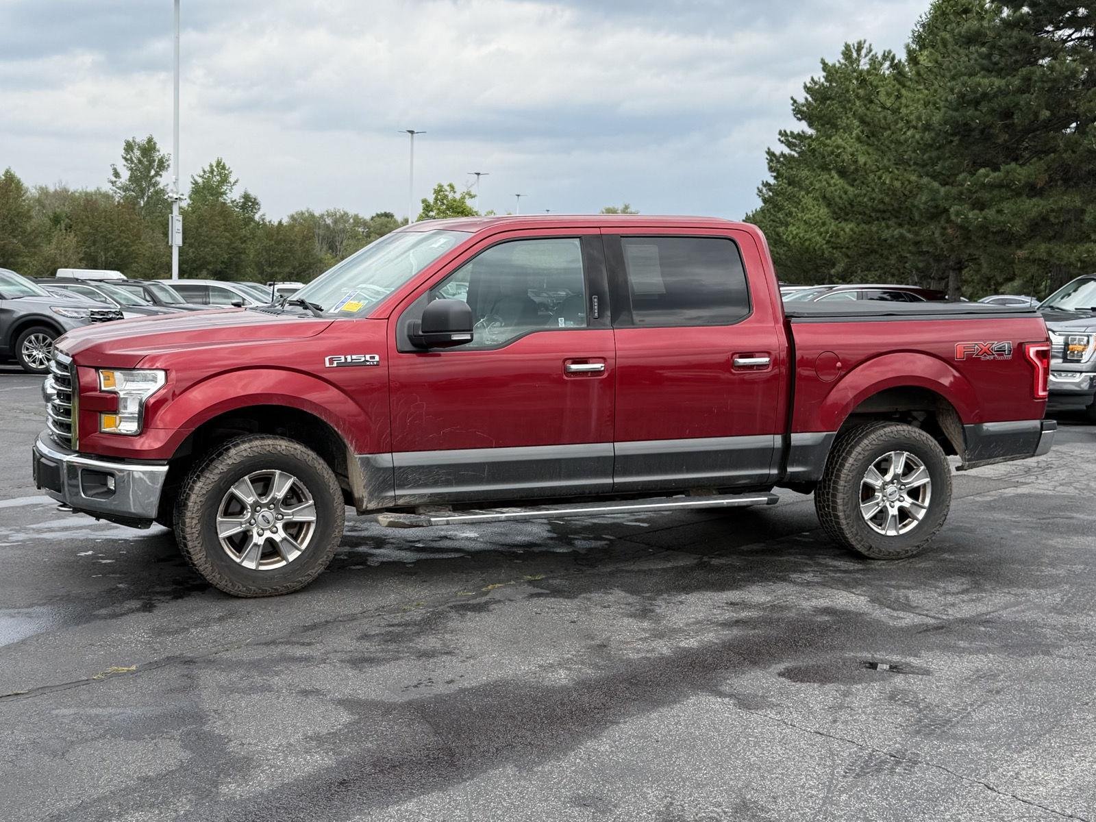 Used 2017 Ruby Red Metallic Tinted Clearcoat/Magnetic Ford XLT image 4