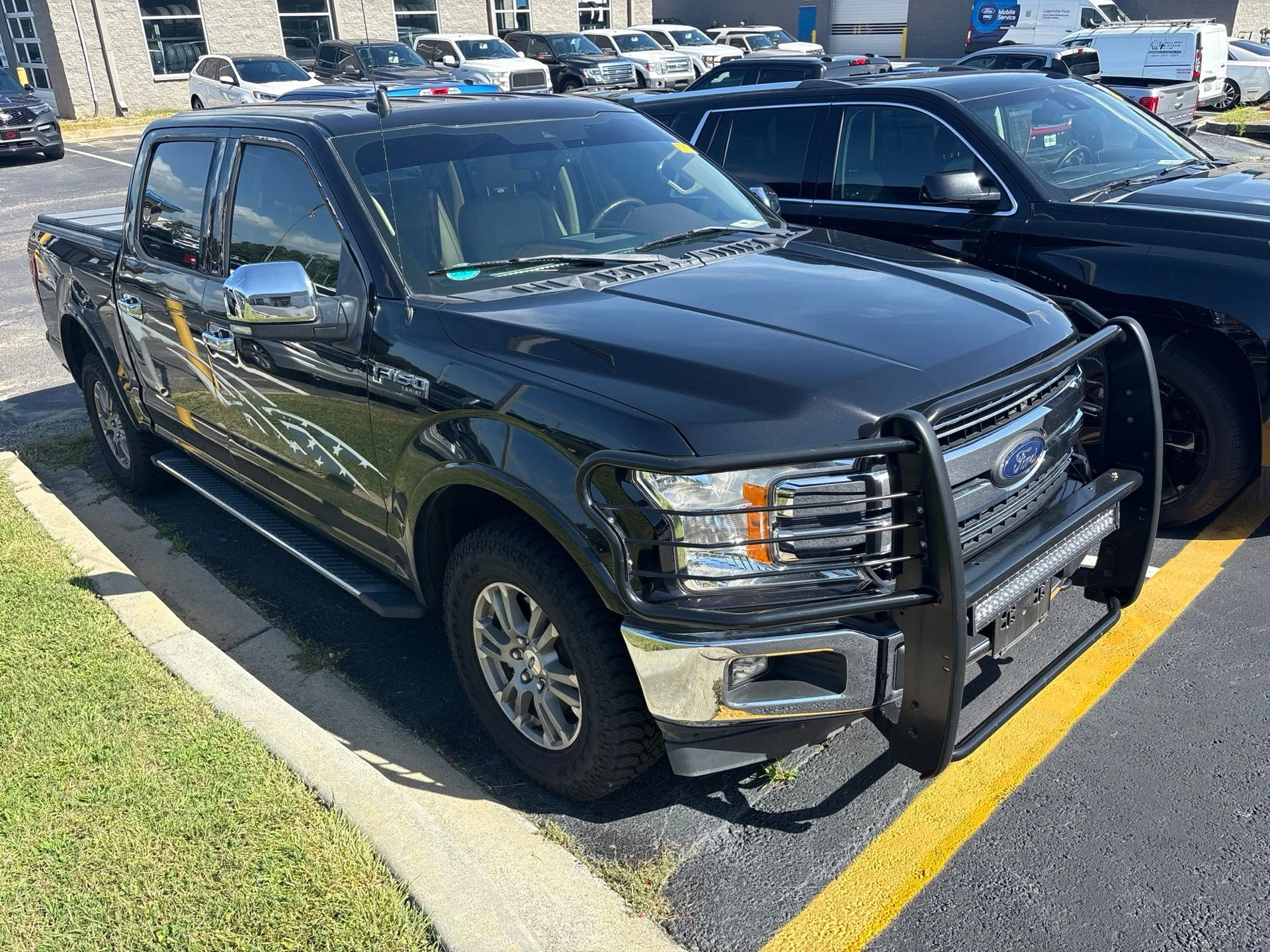 Used 2019 Black Metallic Ford Lariat image 2