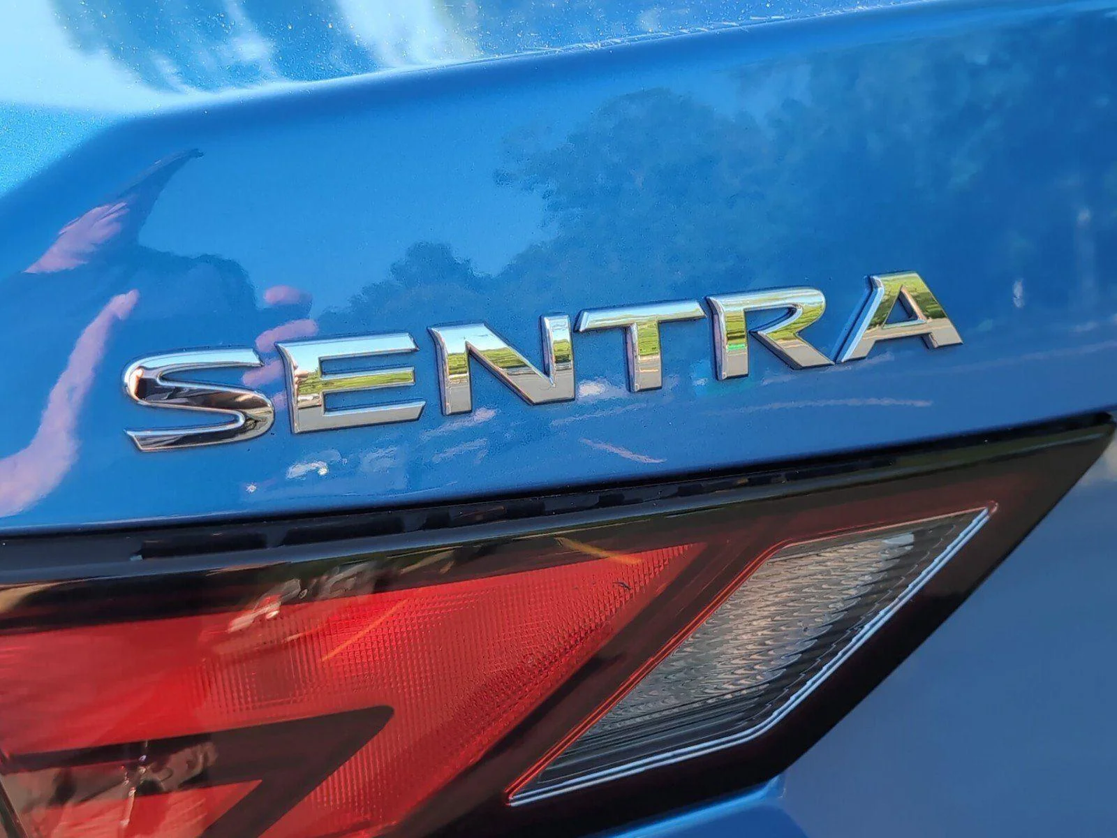 Used 2024 Electric Blue Metallic Nissan SV image 32