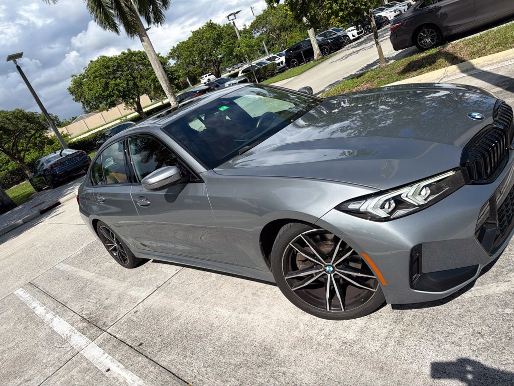 Certified Used 2023 Skyscraper Gray Metallic BMW 330i image 1
