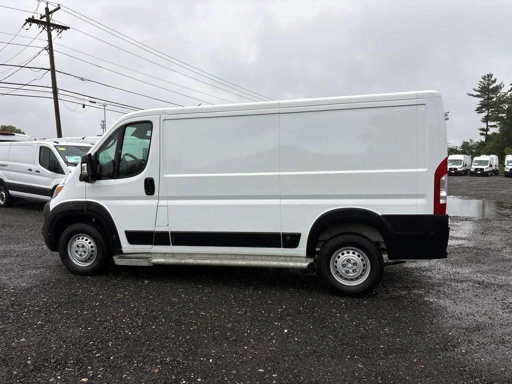 Used 2025 Bright White Clearcoat Ram  image 4