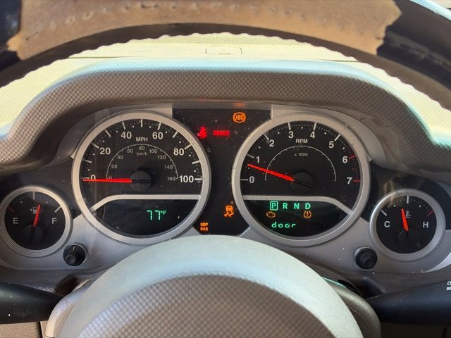 Used 2010 Red Jeep Unlimited Sahara image 29