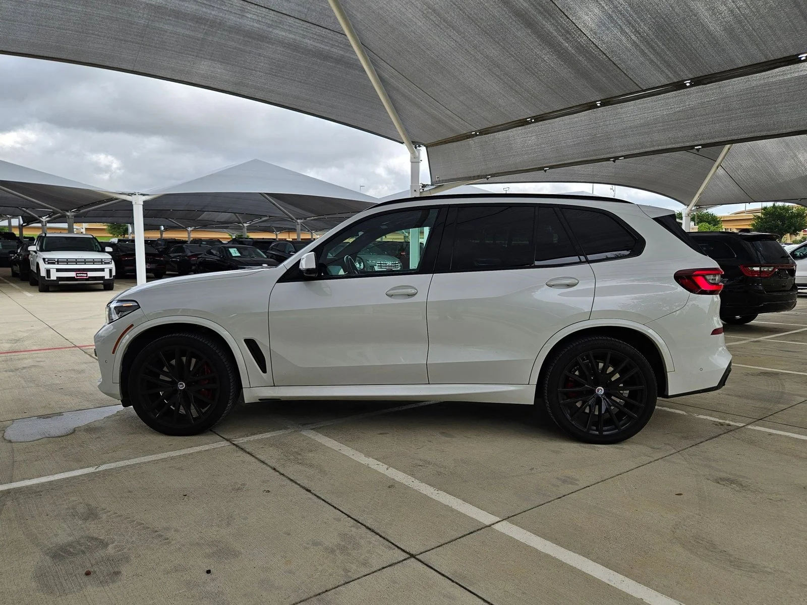 Used 2022 Mineral White Metallic BMW M50i image 8