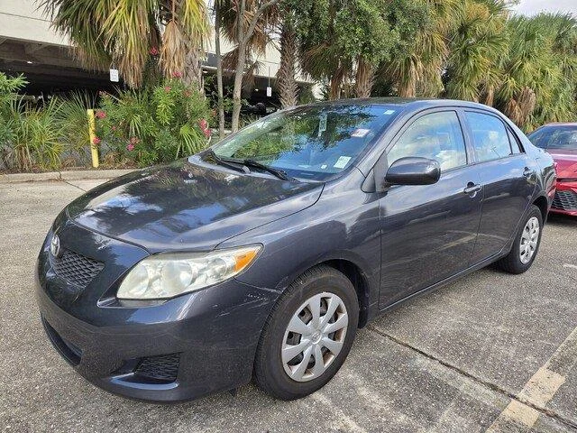 Used 2010 Magnetic Gray Metallic Toyota LE image 1