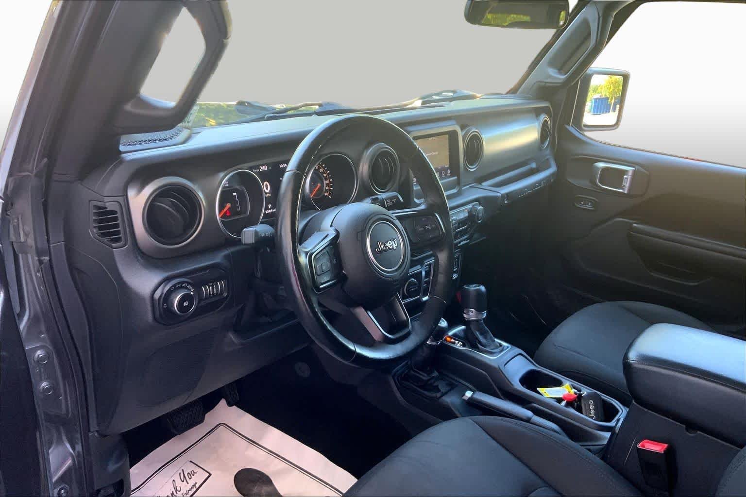 Used 2018 Granite Crystal Metallic Clearcoat Jeep Sport S image 17