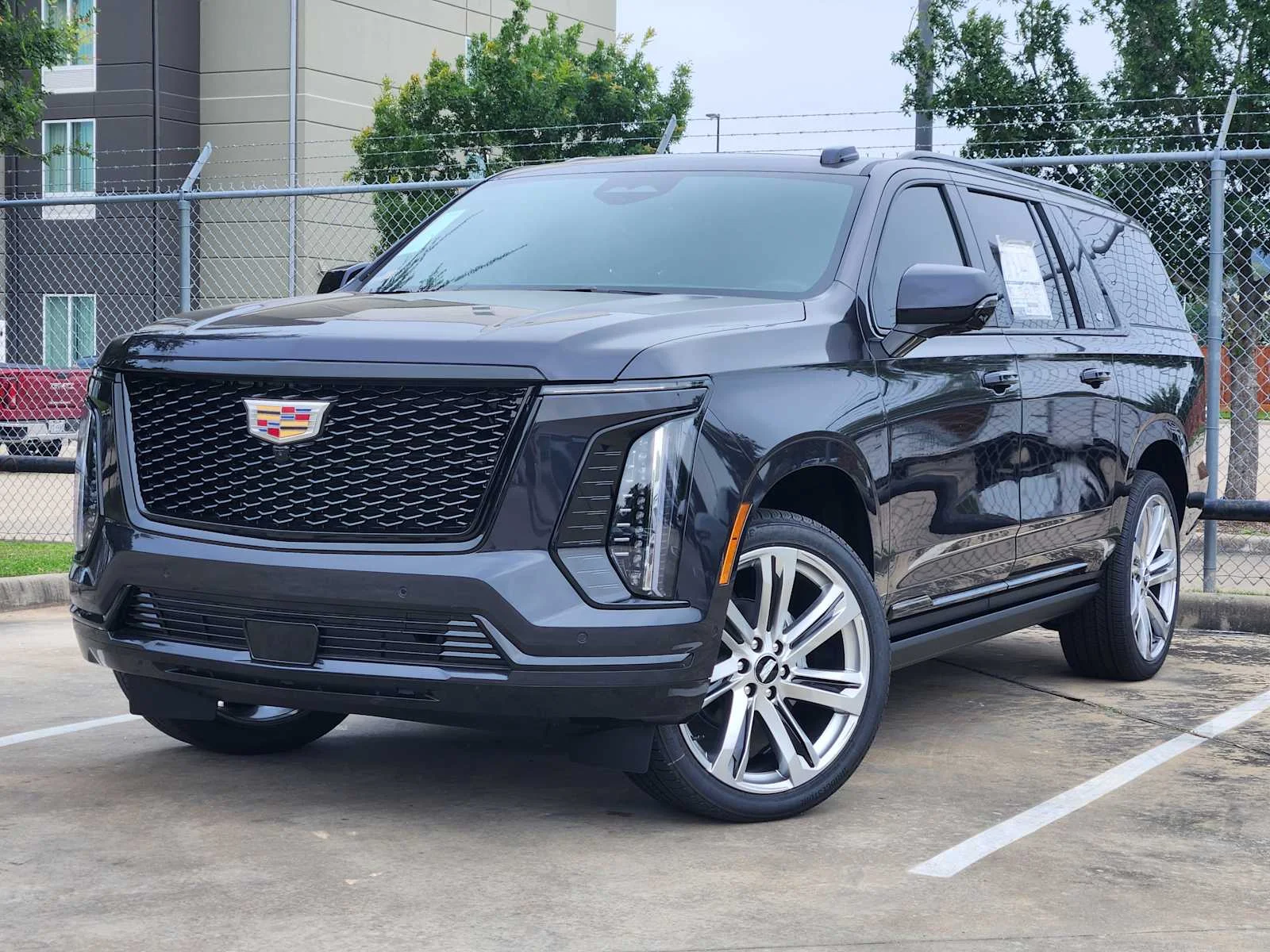 New 2026 Galactic Gray Metallic Cadillac Sport image 1