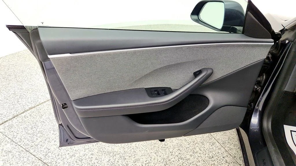 Used 2025 Stealth Grey Tesla Long Range RWD image 11