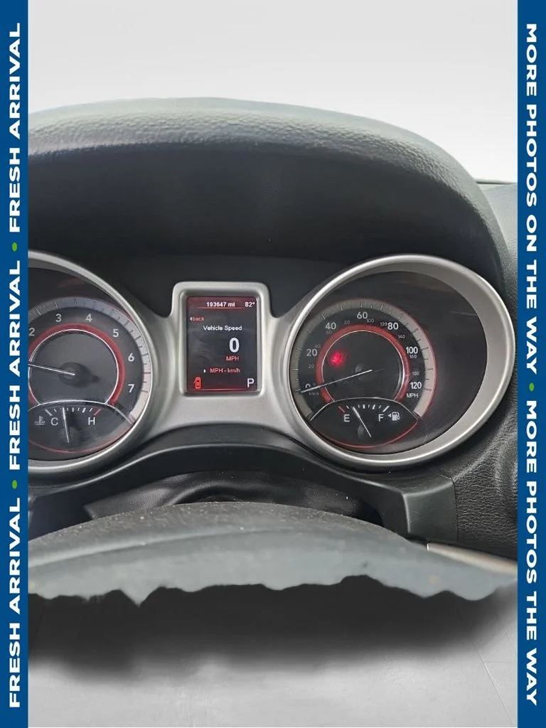 Used 2012 Black Dodge SXT image 1
