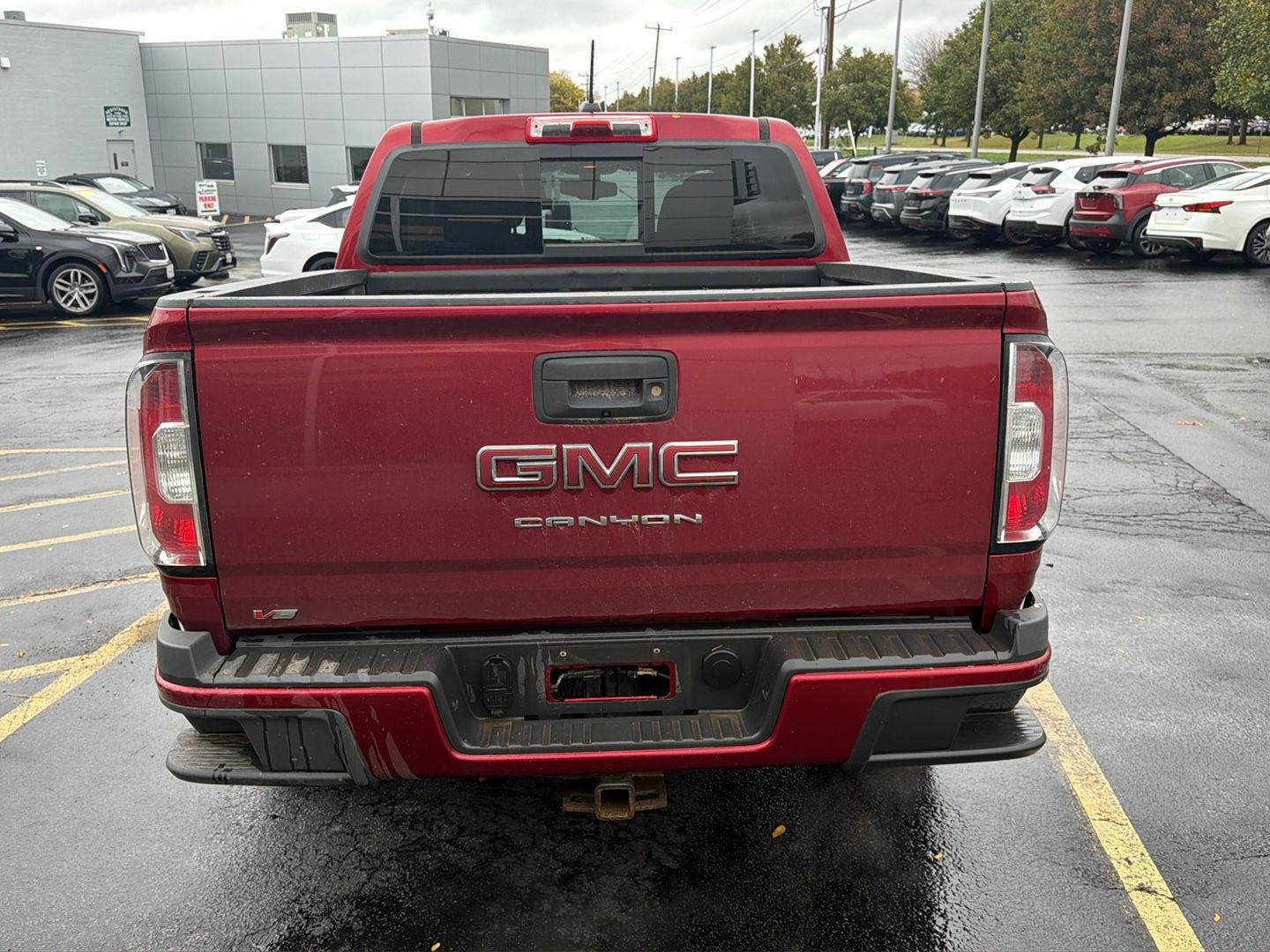 Used 2021 Cayenne Red Tintcoat GMC 4WD Elevation image 5