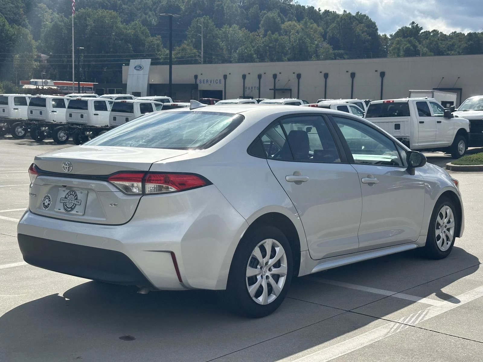 Used 2023 Classic Silver Metallic Toyota LE image 7