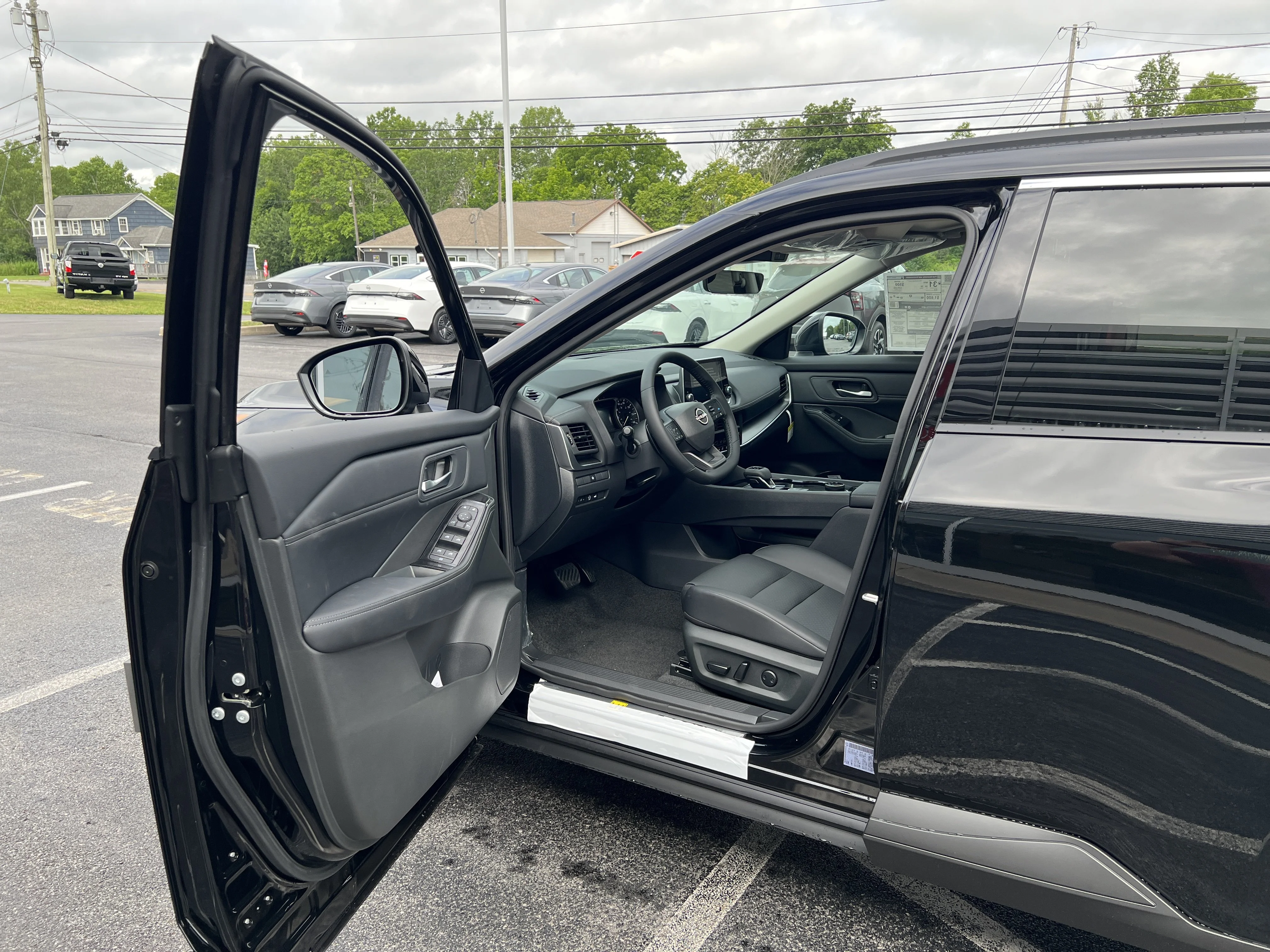 New 2026 Super Black Nissan Dark Armor image 3